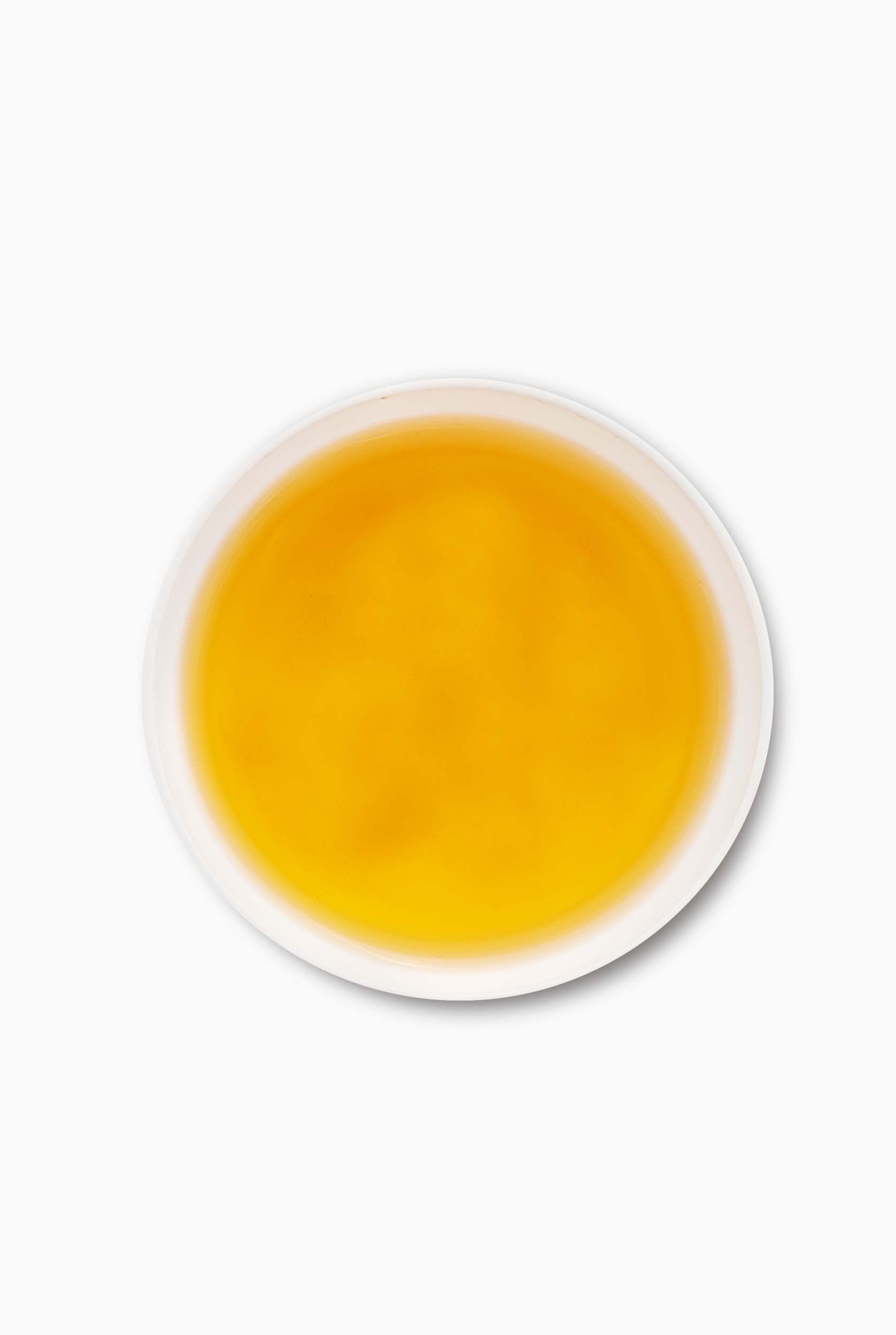 A Bright Golden Liquor describes - Moonlight White Tea from Darjeeling 